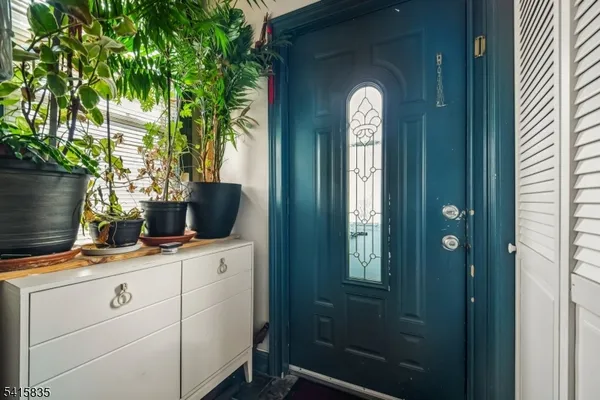 a view of a bathroom with a sink and mirror