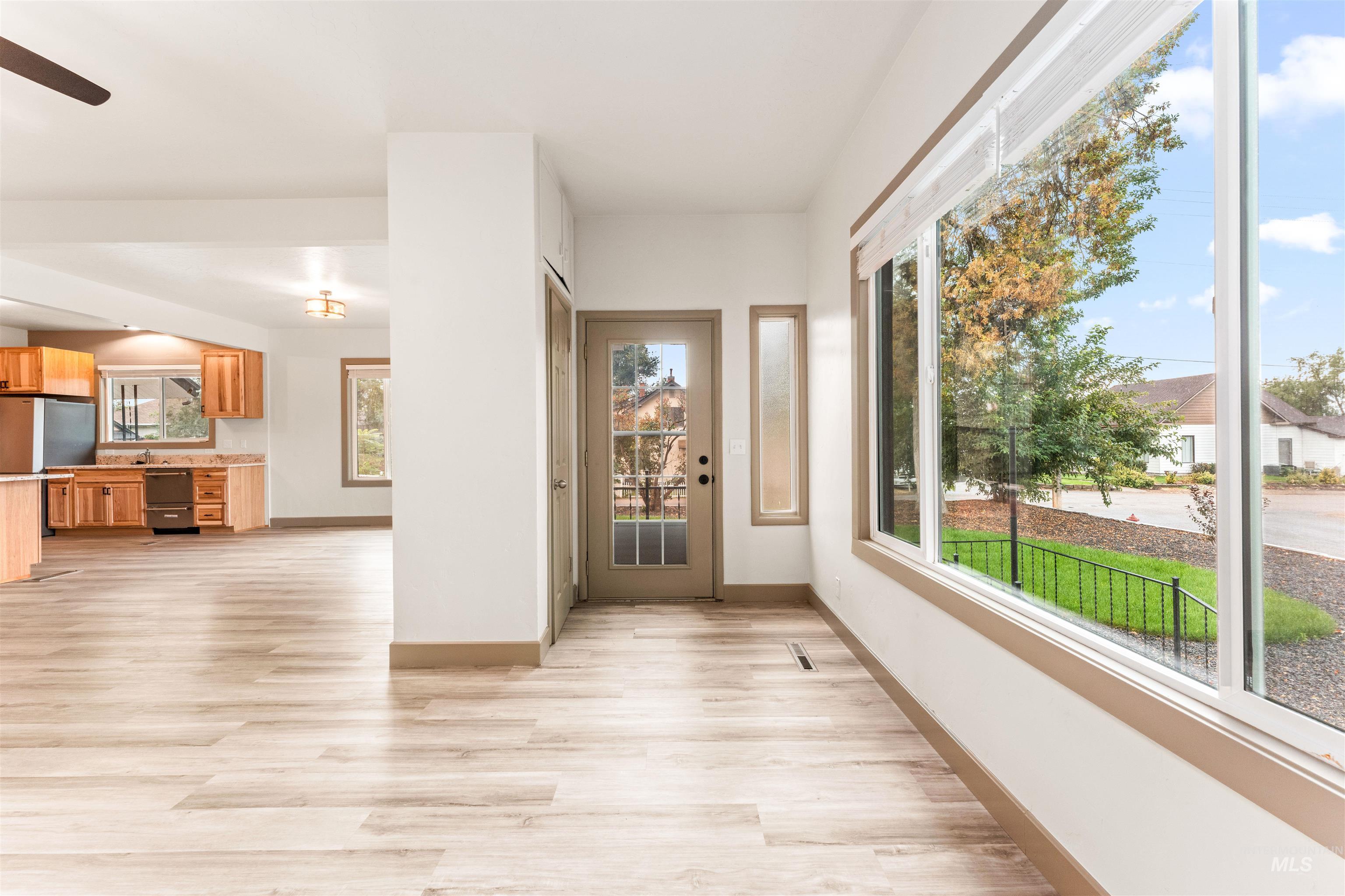 602 North 5th Street Parma, ID 83660 - Photo 12 of 48 Entrance foyer featuring light wood-style flooring and a ceiling fan