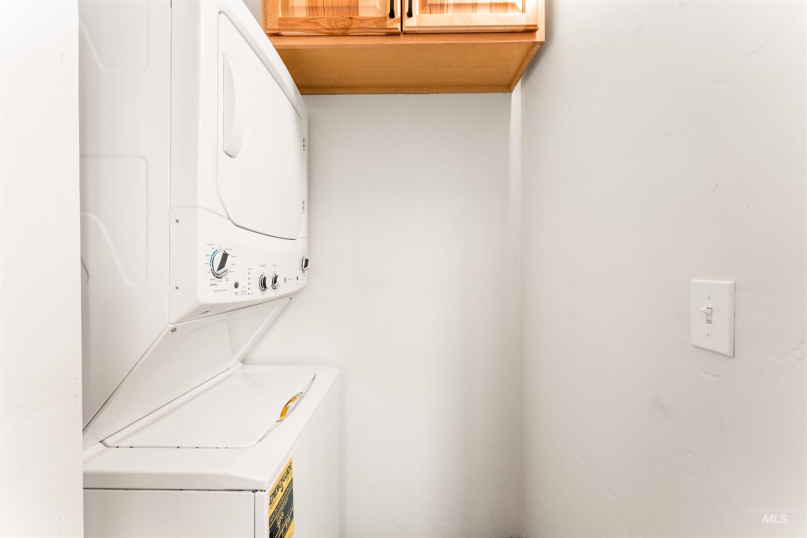 602 North 5th Street Parma, ID 83660 - Photo 28 of 48 Washroom with stacked washing machine and dryer