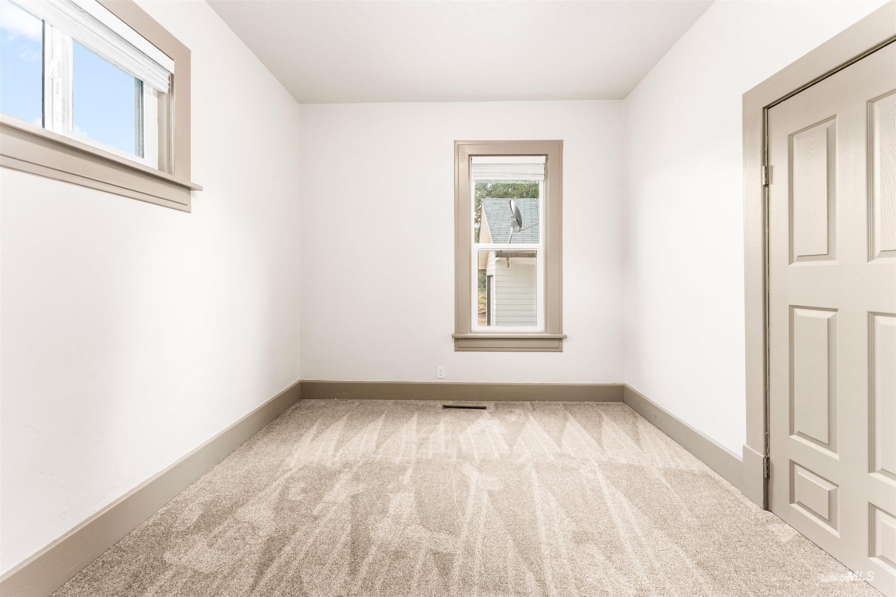 602 North 5th Street Parma, ID 83660 - Photo 30 of 48 Empty room featuring light carpet and baseboards