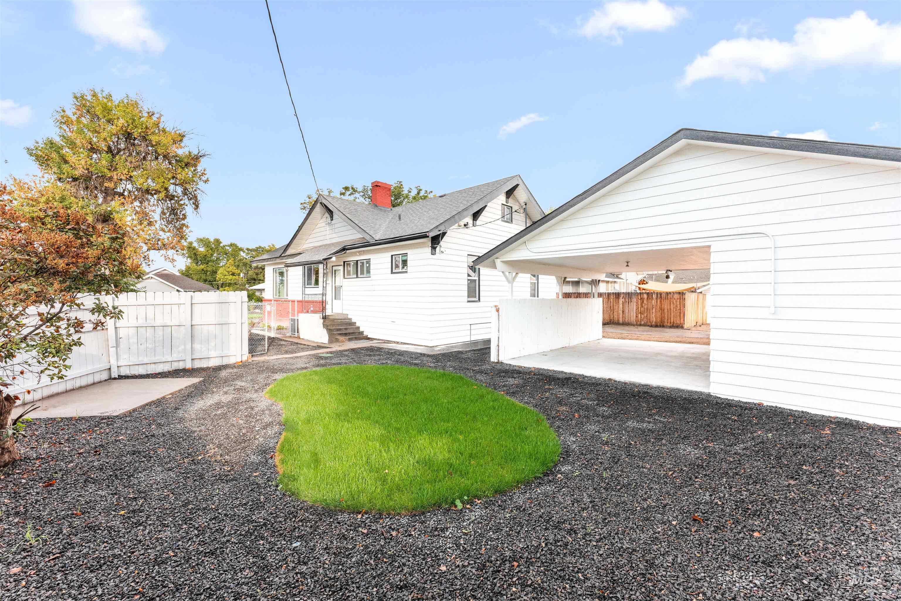 602 North 5th Street Parma, ID 83660 - Photo 6 of 48 Rear view of house featuring a patio area