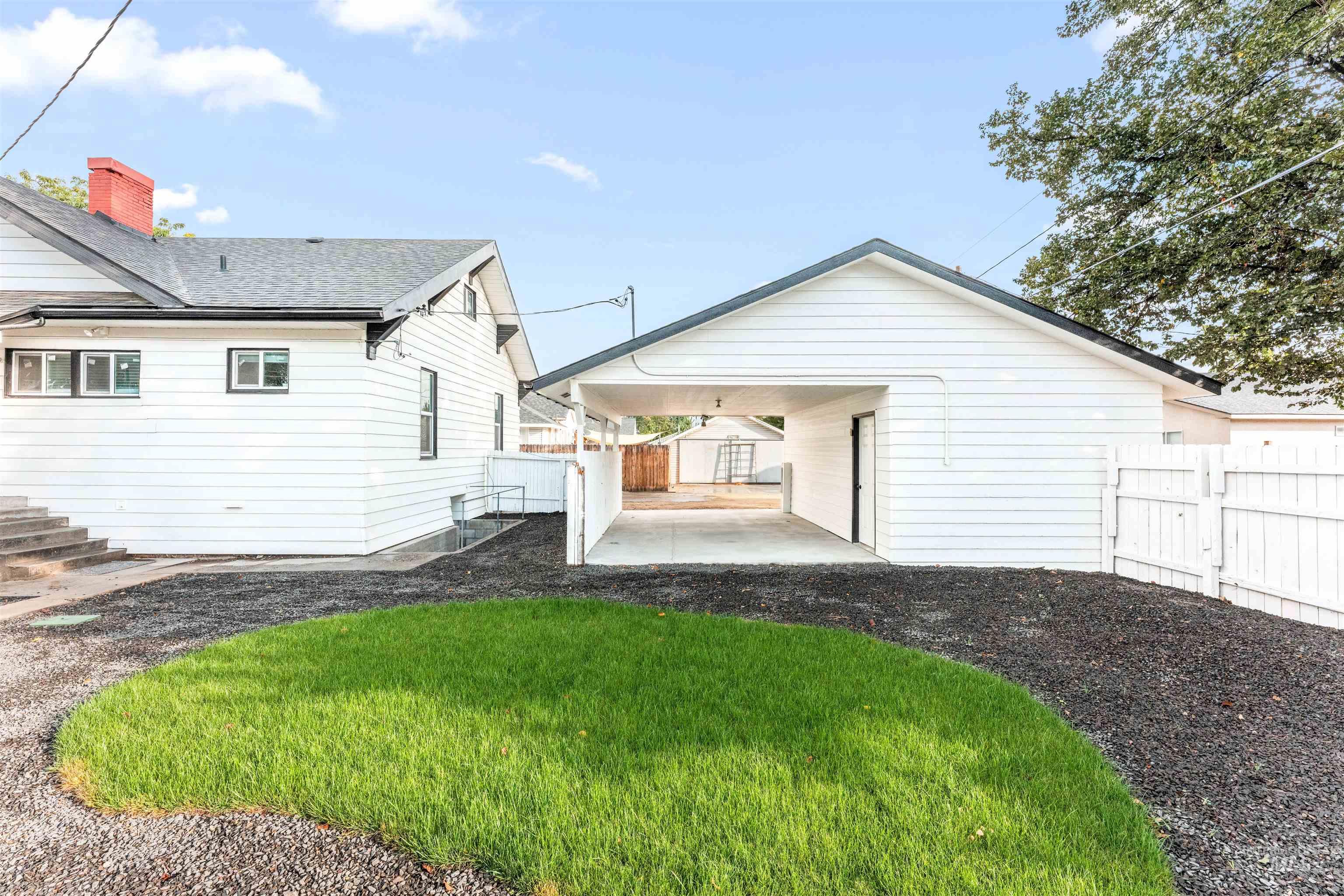 602 North 5th Street Parma, ID 83660 - Photo 7 of 48 Rear view of house featuring a patio