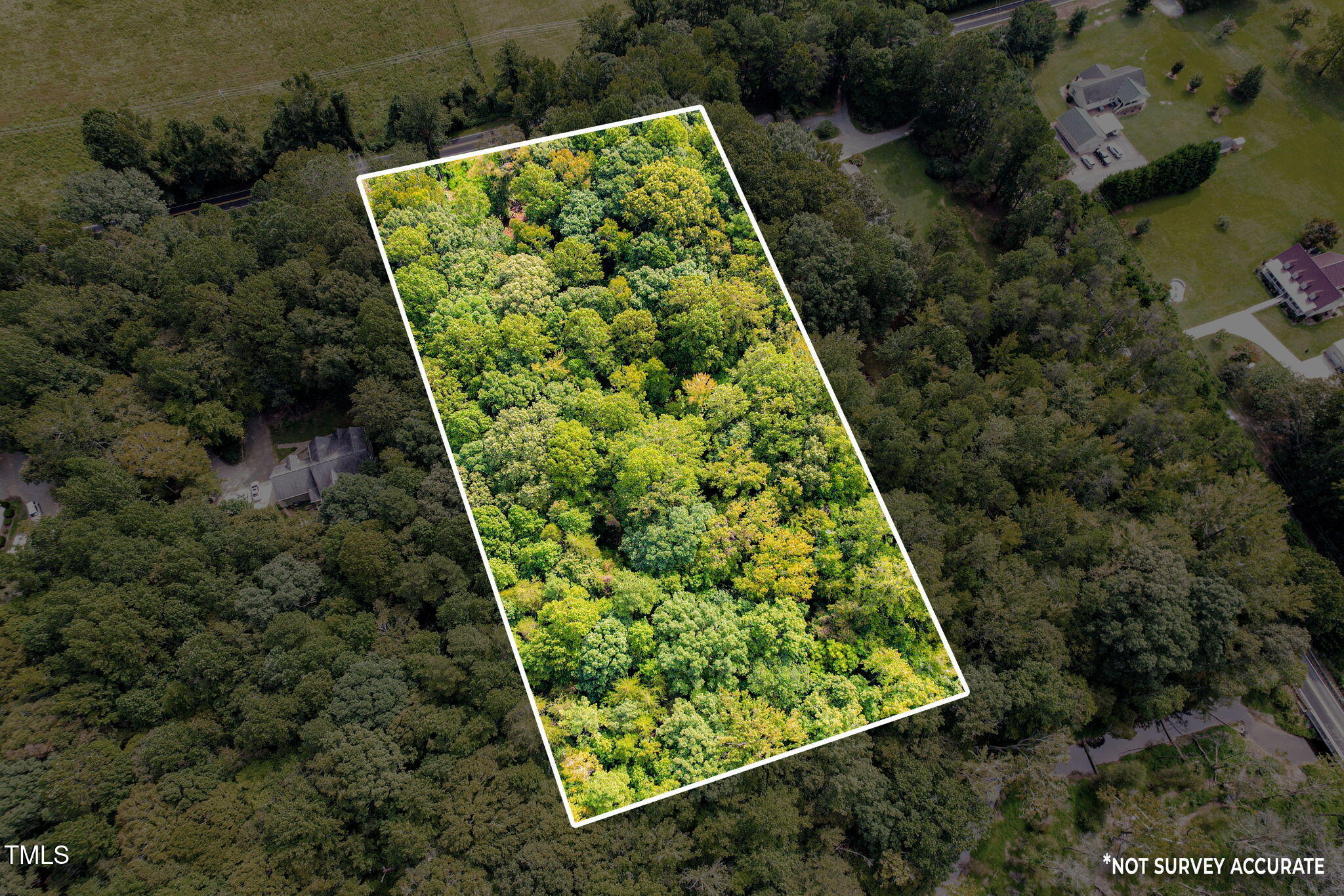 1455 Dimmocks Mill Road Hillsborough, NC 27278 - Photo 15 of 19 an aerial view of a garden