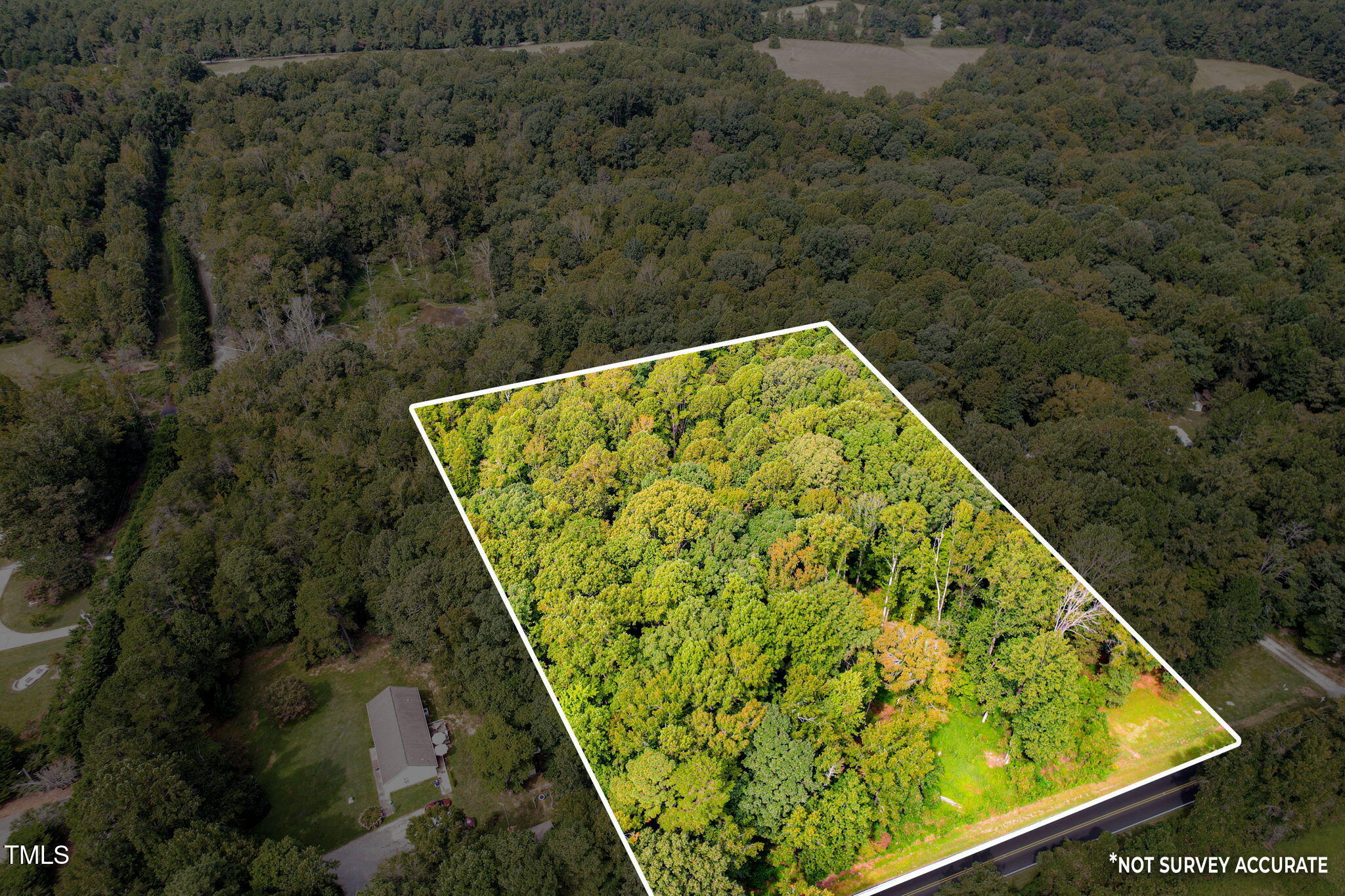 1455 Dimmocks Mill Road Hillsborough, NC 27278 - Photo 17 of 19 a view of a backyard