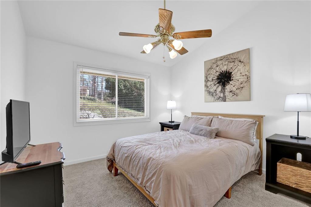 889 Fawn Way Marietta, GA 30068 - Photo 17 of 30 a bedroom with a bed and a window