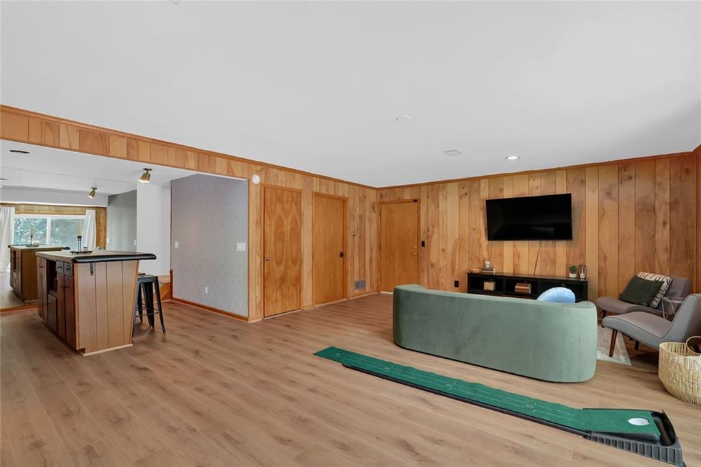 889 Fawn Way Marietta, GA 30068 - Photo 24 of 30 a living room with furniture and a flat screen tv