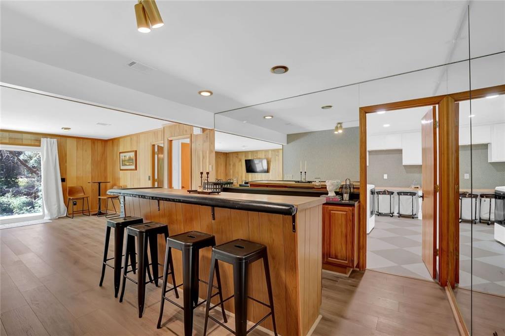 889 Fawn Way Marietta, GA 30068 - Photo 25 of 30 an open kitchen with a table and chairs in it