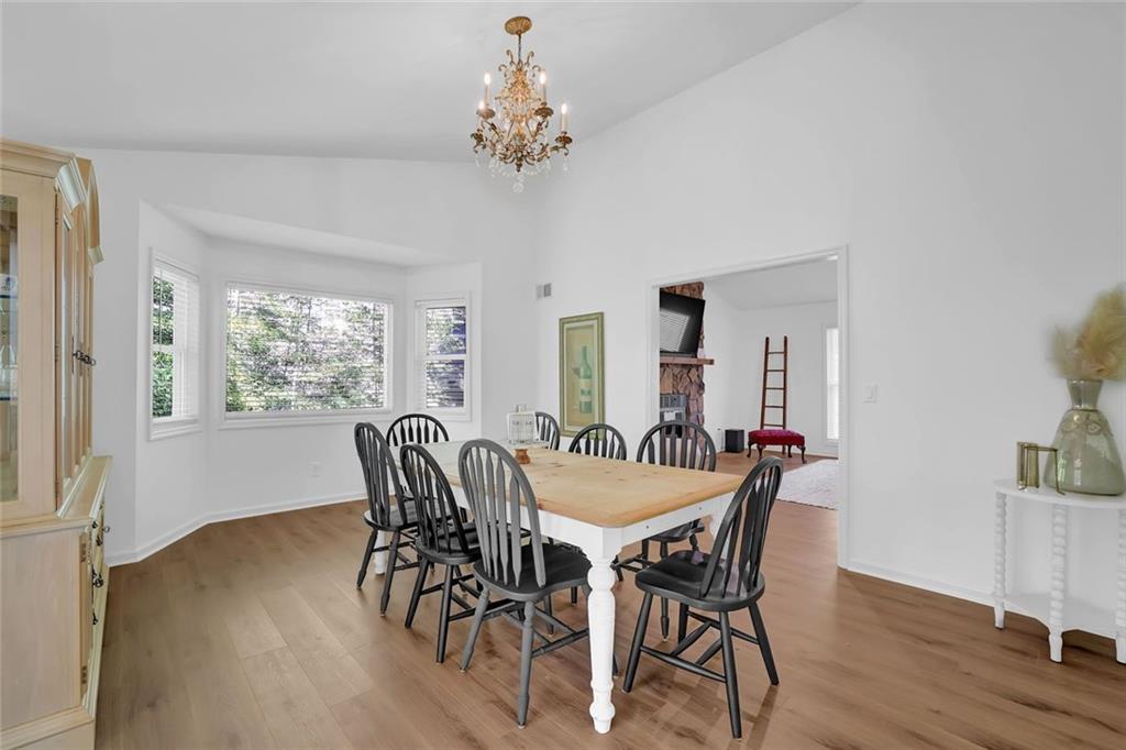 889 Fawn Way Marietta, GA 30068 - Photo 4 of 30 a view of a dining room with furniture window and wooden floor