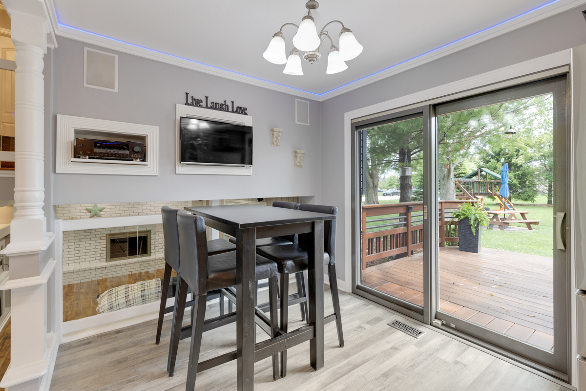 297 Mulberry Road Frankfort, IL 60423 - Photo 11 of 47 a view of a dining room with furniture window and outside view