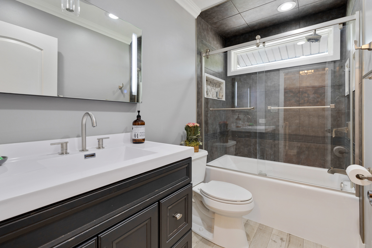 297 Mulberry Road Frankfort, IL 60423 - Photo 15 of 47 a bathroom with a sink a toilet and shower