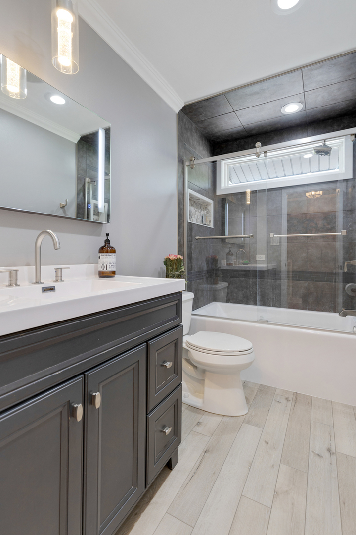 297 Mulberry Road Frankfort, IL 60423 - Photo 16 of 47 a bathroom with a sink a toilet and shower