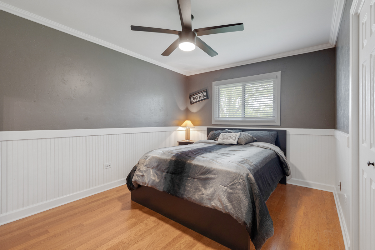 297 Mulberry Road Frankfort, IL 60423 - Photo 17 of 47 a bedroom with a bed and window