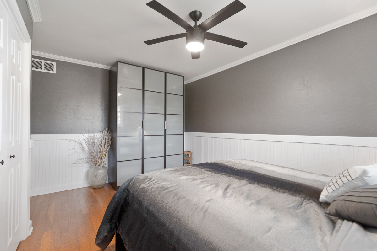 297 Mulberry Road Frankfort, IL 60423 - Photo 18 of 47 a bedroom with a bed and a ceiling fan