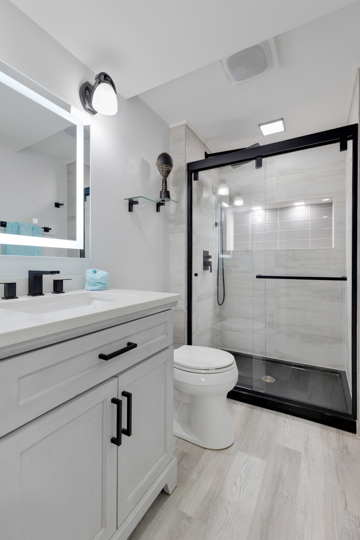 297 Mulberry Road Frankfort, IL 60423 - Photo 23 of 47 a bathroom with a shower sink vanity mirror and toilet