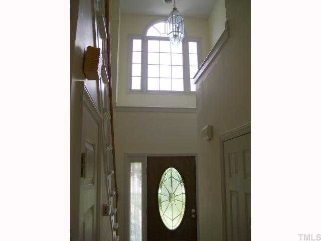 6301 Ashley Ridge Drive Raleigh, NC 27612 - Photo 6 of 12 a front view of a house with wooden floor
