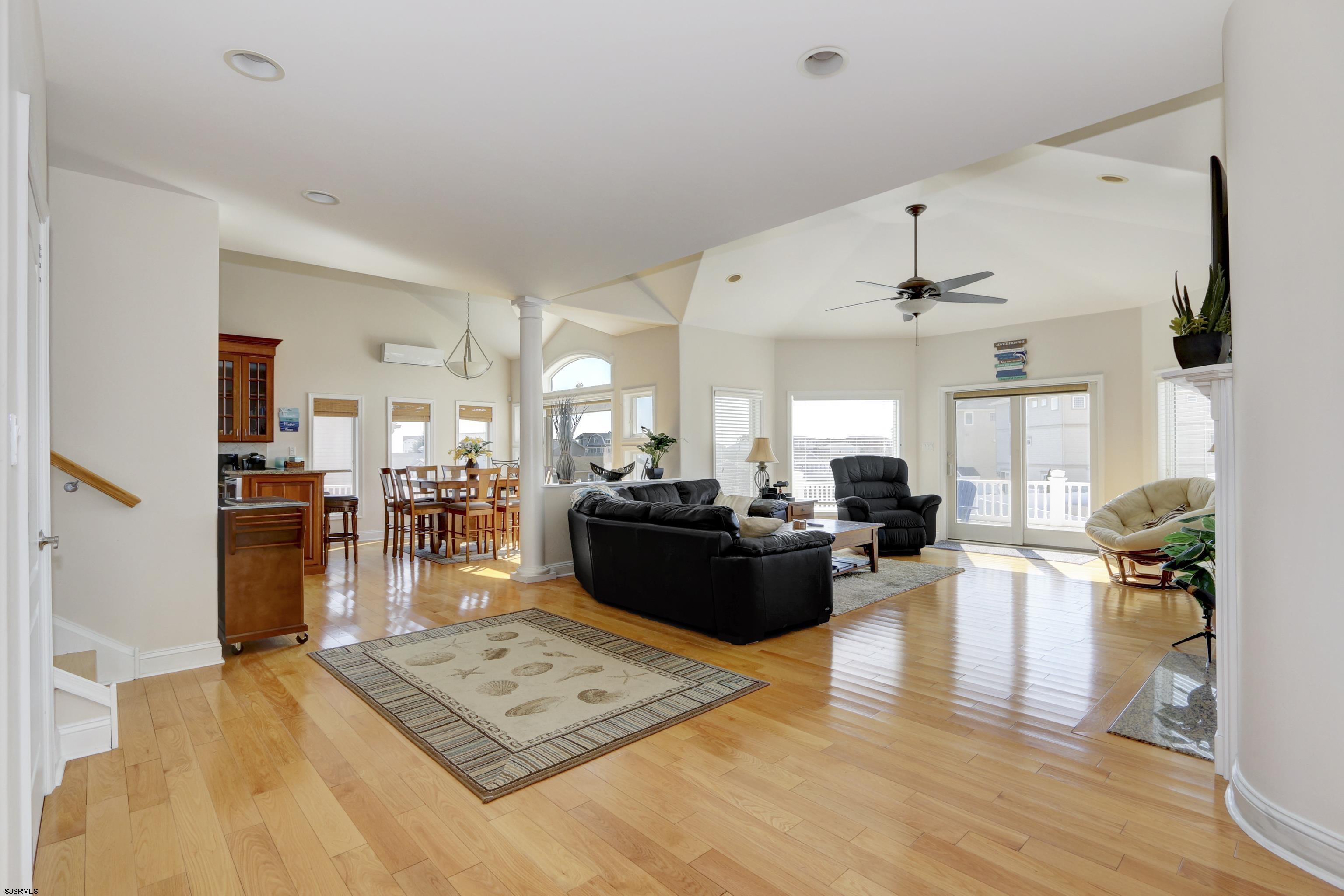 5219 Seaspray Road Brigantine, NJ 08203 - Photo 18 of 39 a living room with furniture and a wooden floor