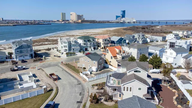 a view of city and ocean with boats
