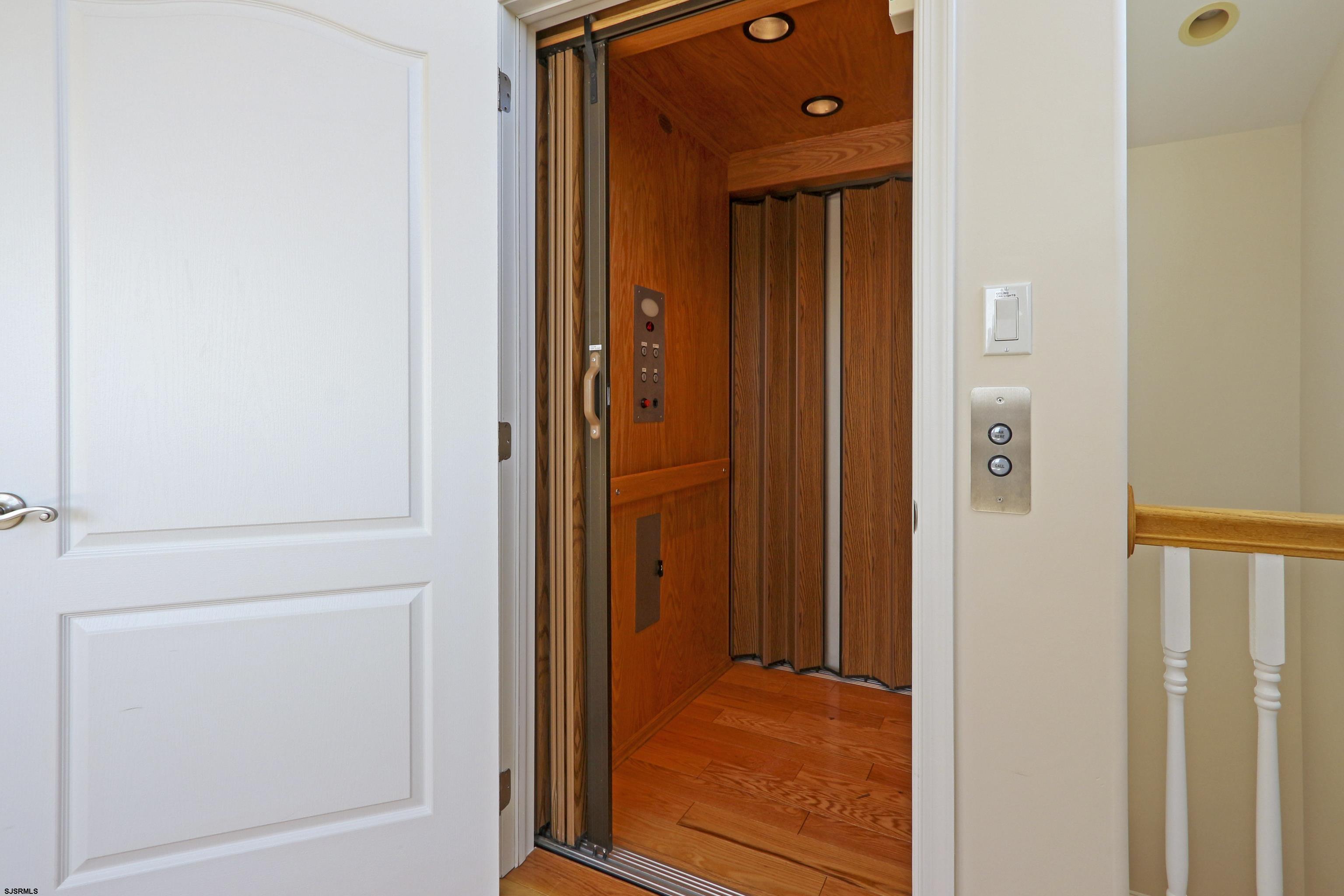 5219 Seaspray Road Brigantine, NJ 08203 - Photo 33 of 39 a view of a bathroom from a hallway