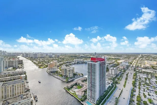 a kitchen filled counter top space a sink cabinets and appliances