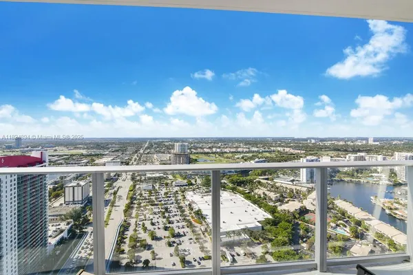 a view of a lake with a city