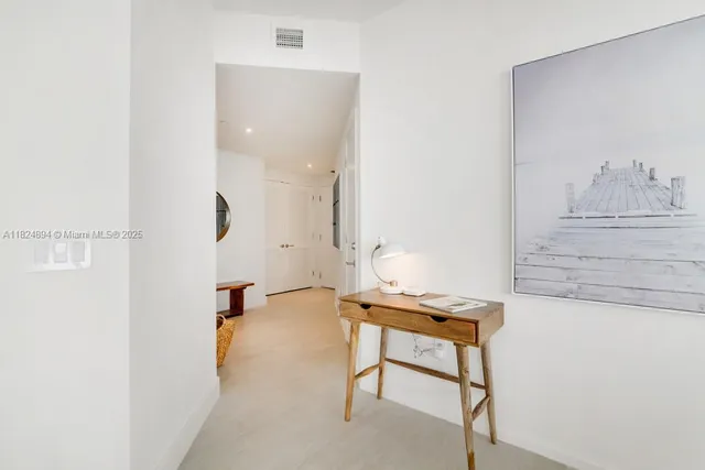 a view of workspace with wooden floor