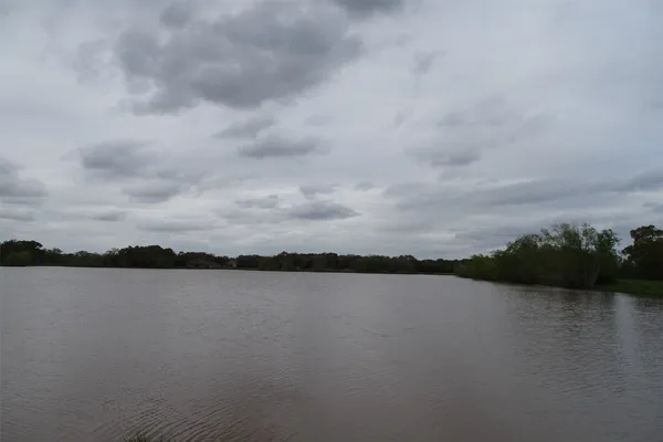 a view of lake with mountain