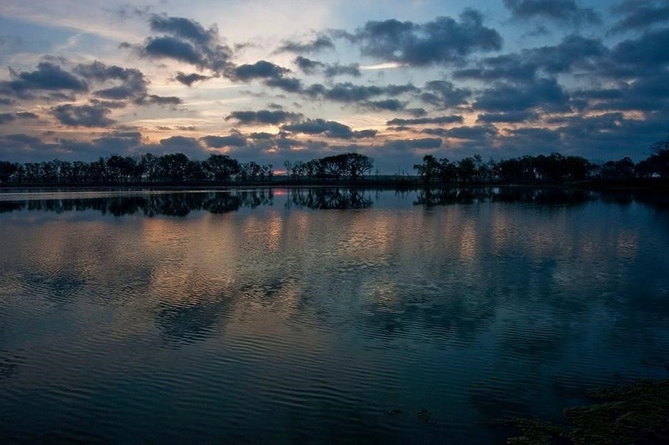 21210 Chenango Lake Drive Angleton, TX 77515 - Photo 13 of 15 a view of a lake