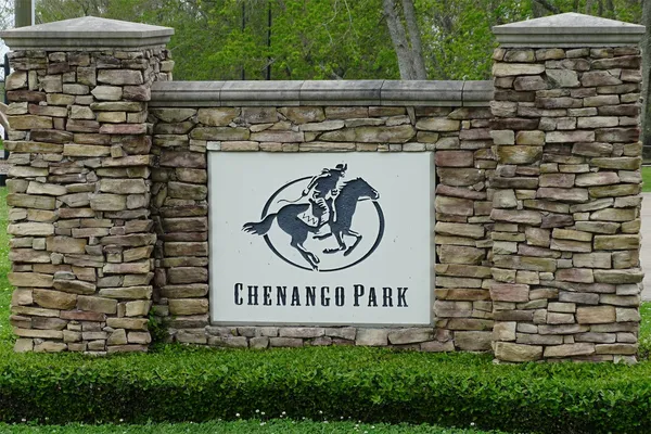 a view of a park with swings and slides