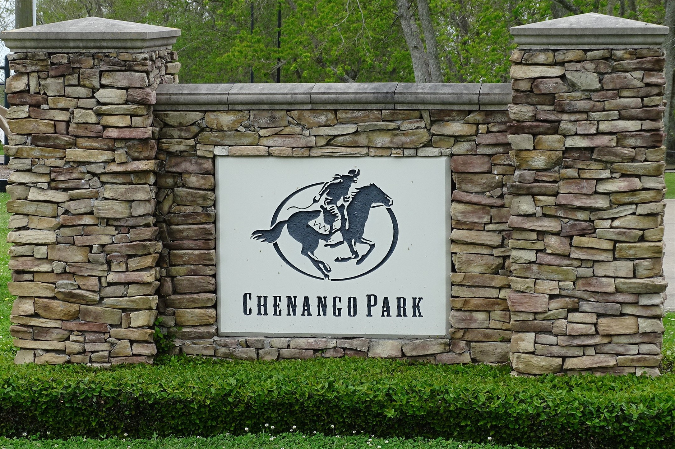 21210 Chenango Lake Drive Angleton, TX 77515 - Photo 8 of 15 a view of a sign board with a bench