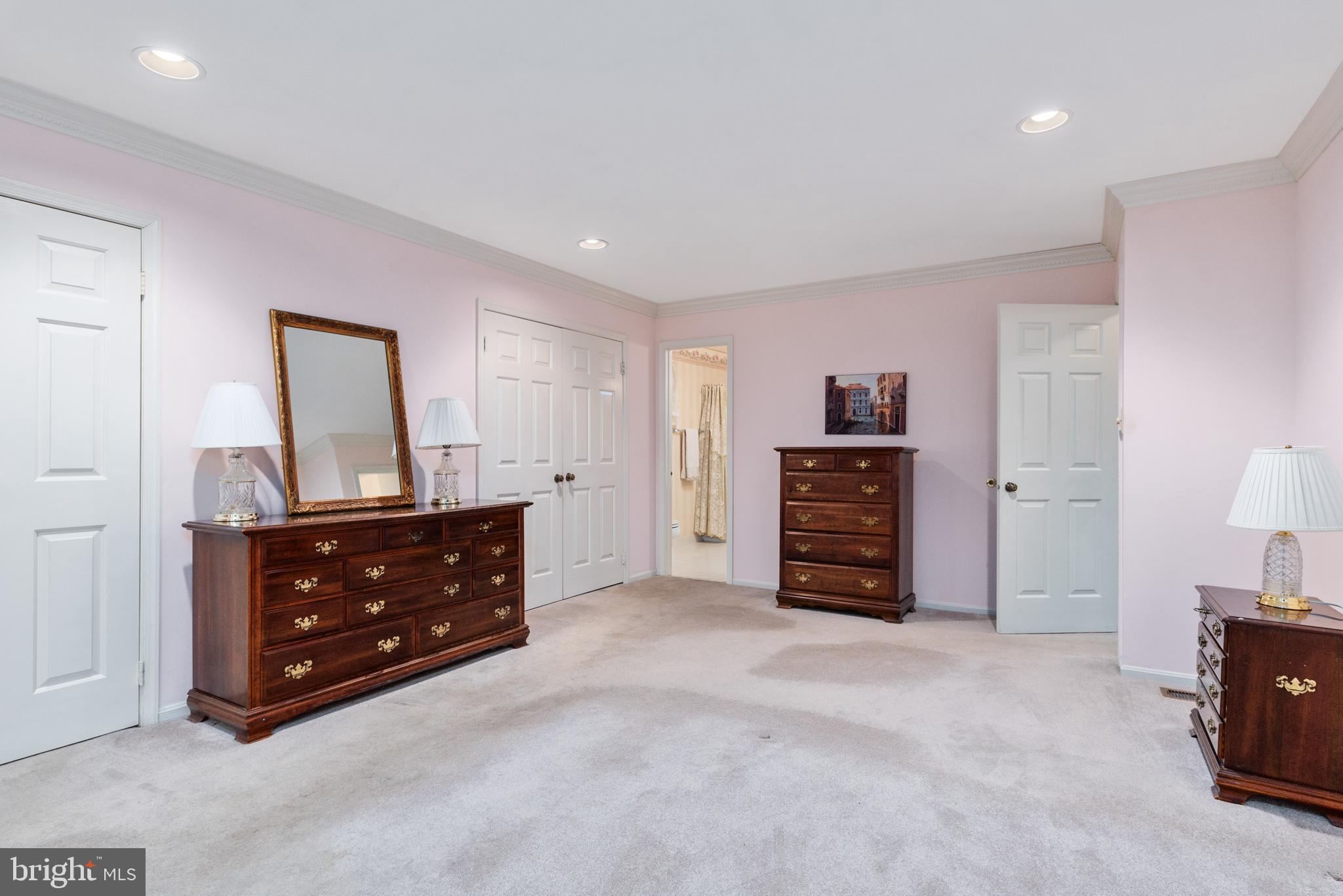 15113 Winstead Lane Silver Spring, MD 20905 - Photo 24 of 37 MBR wall length closet w/ custom shelving