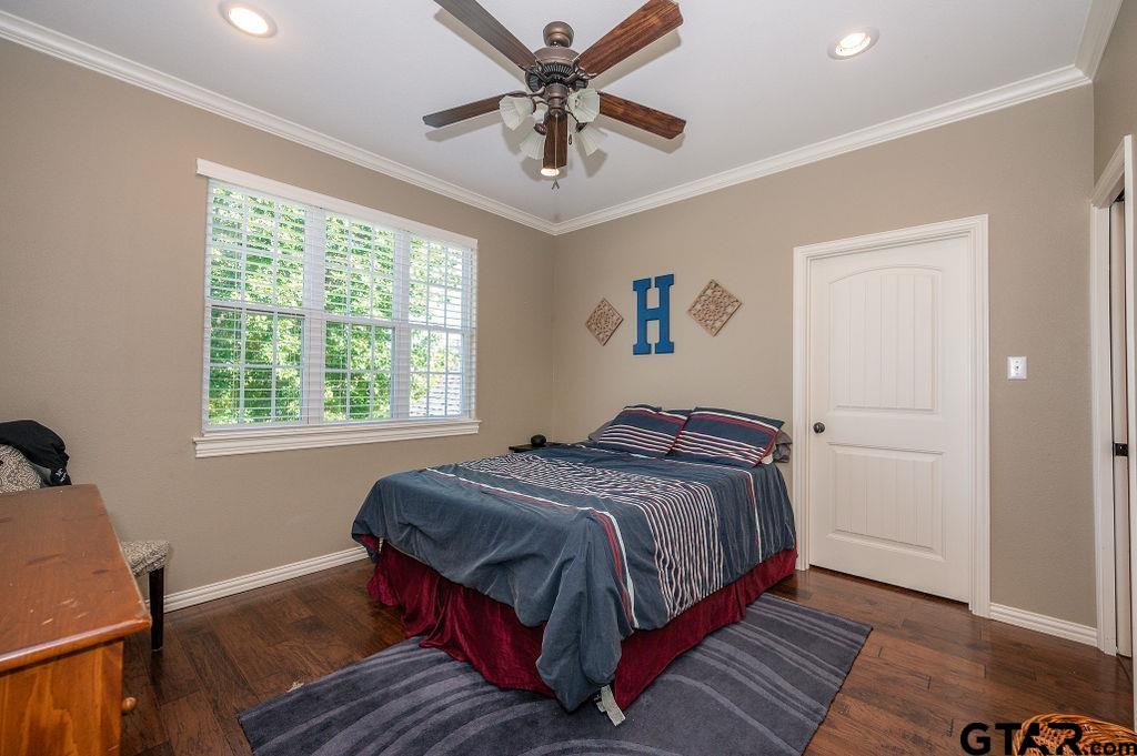 8553 Castleton Way Tyler, TX 75703 - Photo 28 of 38 a bedroom with a bed and window