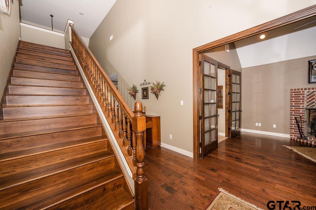 8553 Castleton Way Tyler, TX 75703 - Photo 5 of 38 a view of an entryway with wooden floor