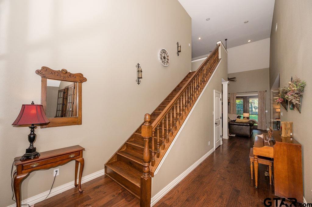 8553 Castleton Way Tyler, TX 75703 - Photo 6 of 38 a view of entryway and hall with wooden floor