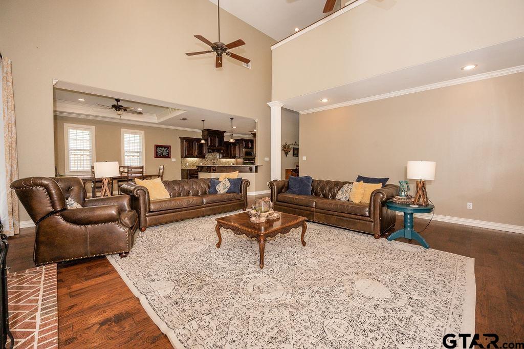 8553 Castleton Way Tyler, TX 75703 - Photo 9 of 38 a living room with furniture and a rug
