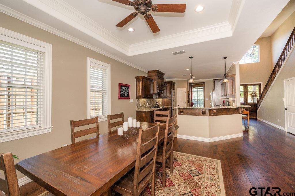 8553 Castleton Way Tyler, TX 75703 - Photo 10 of 38 a dining room with wooden floor and a window