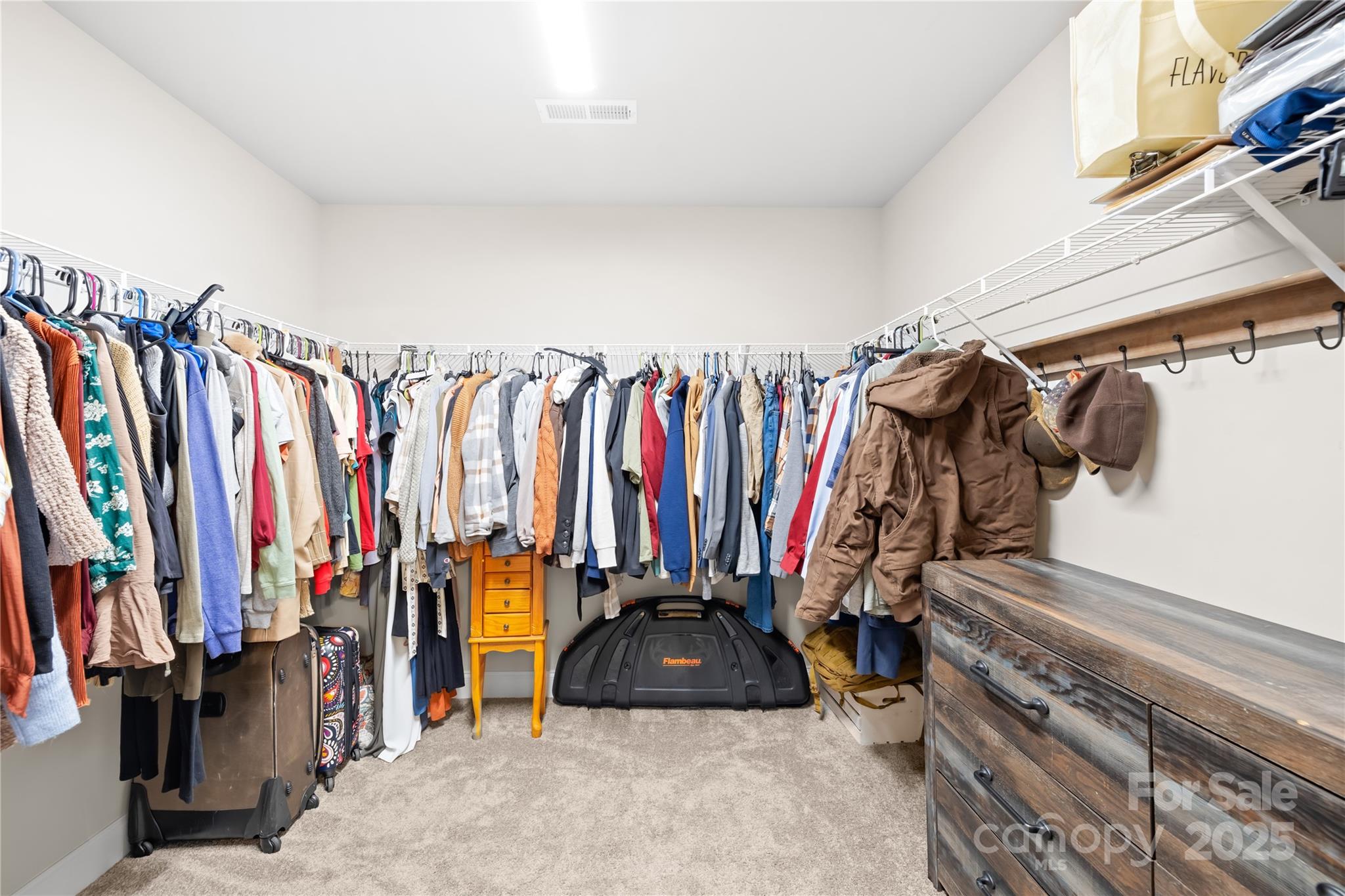 5405 Austin Road Monroe, NC 28112 - Photo 11 of 38 a view of walk in closet with clothes