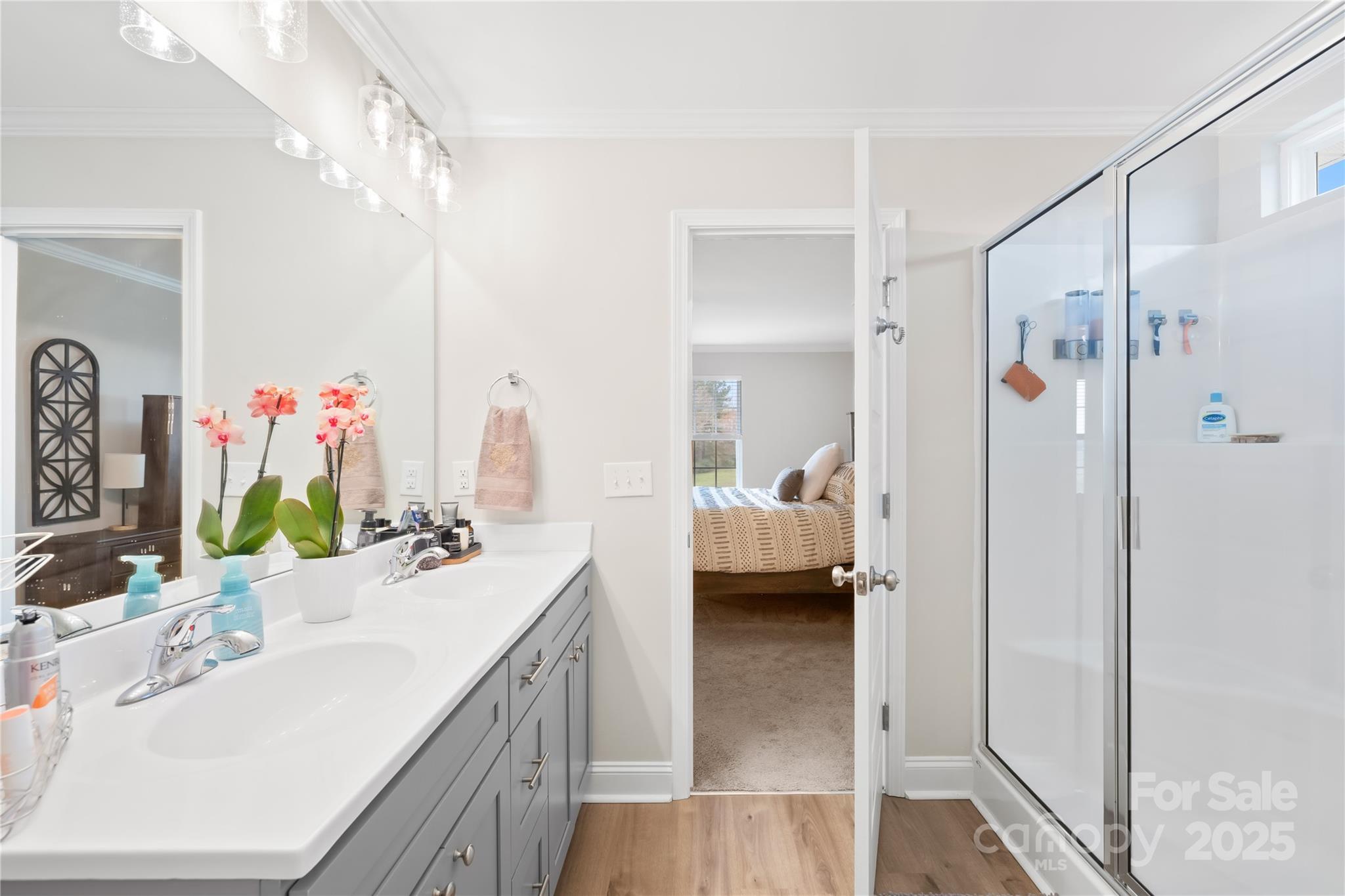 5405 Austin Road Monroe, NC 28112 - Photo 20 of 38 a en suite spacious bathroom with a double vanity sink mirror and shower