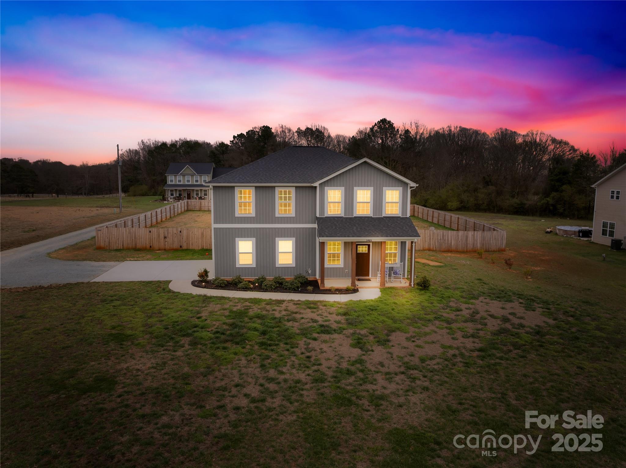 5405 Austin Road Monroe, NC 28112 - Photo 2 of 38 a view of a house with a big yard