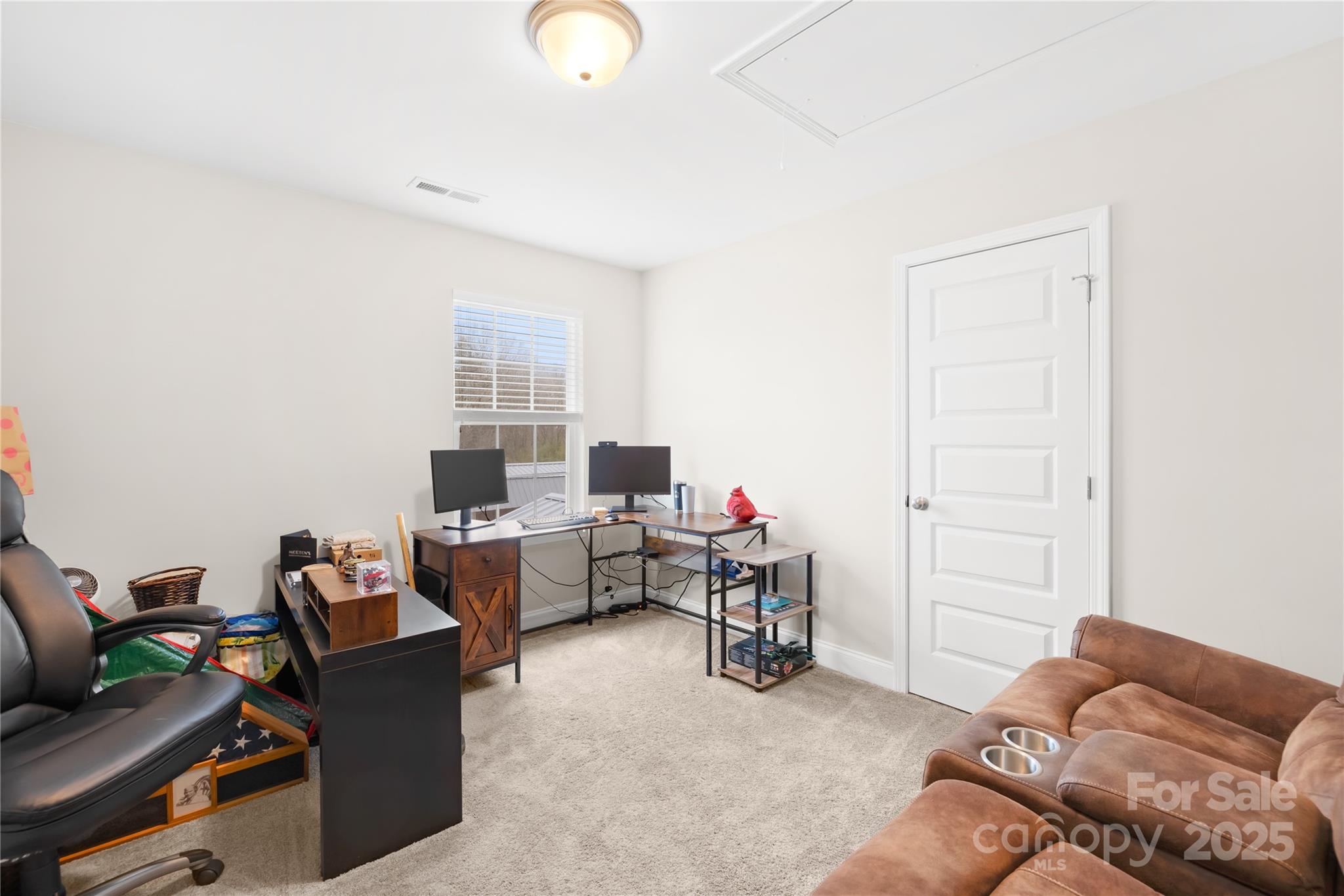 5405 Austin Road Monroe, NC 28112 - Photo 25 of 38 a living room with furniture and a window
