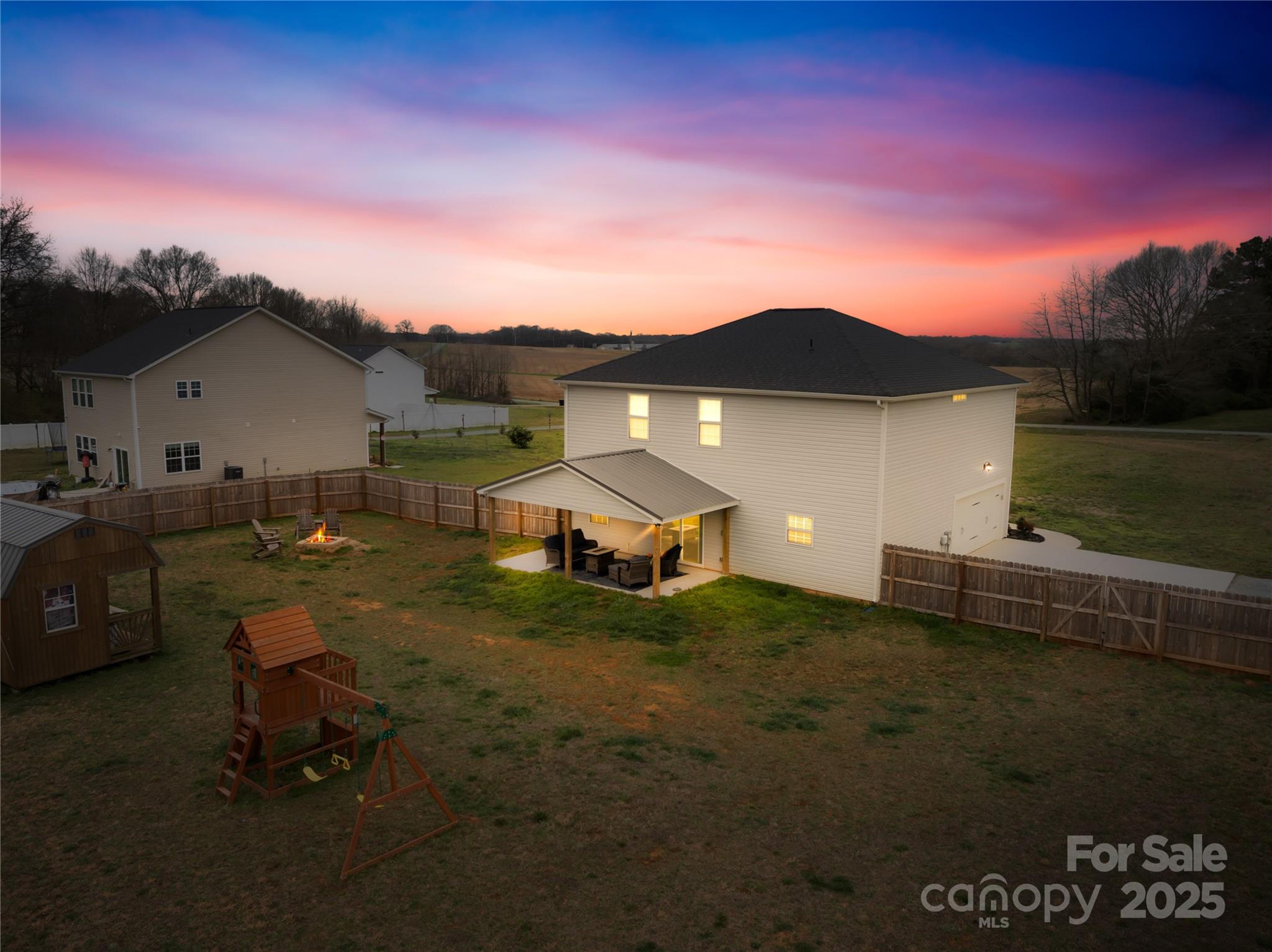 5405 Austin Road Monroe, NC 28112 - Photo 27 of 38 a view of a backyard with sitting area