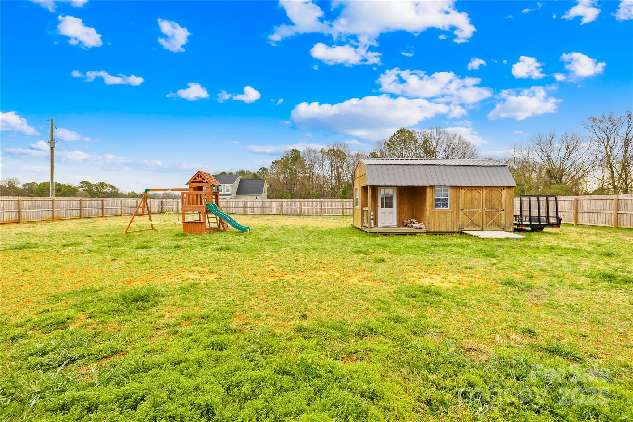 5405 Austin Road Monroe, NC 28112 - Photo 30 of 38 a view of a house with a yard