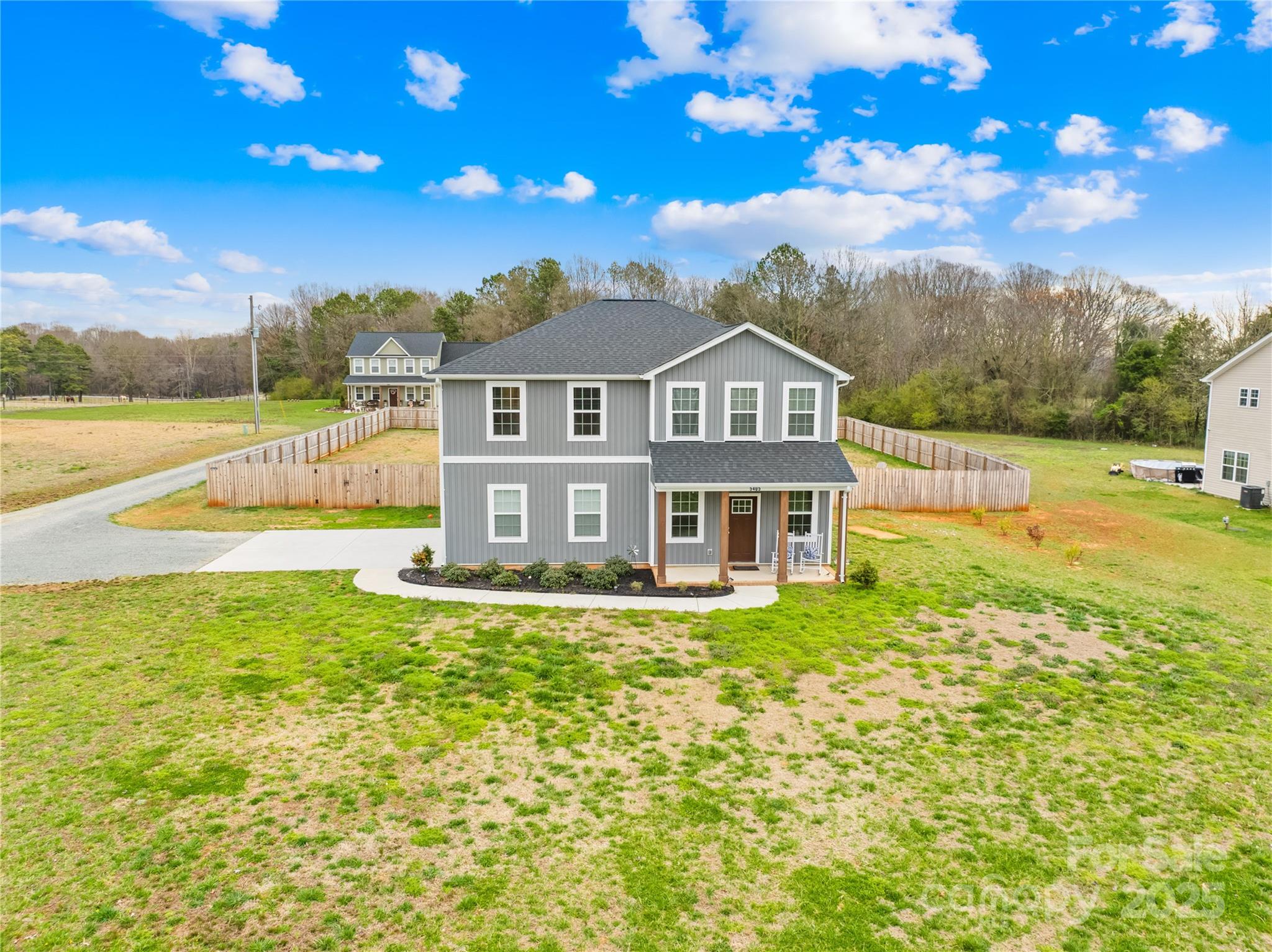 5405 Austin Road Monroe, NC 28112 - Photo 4 of 38 a view of a house with a big yard