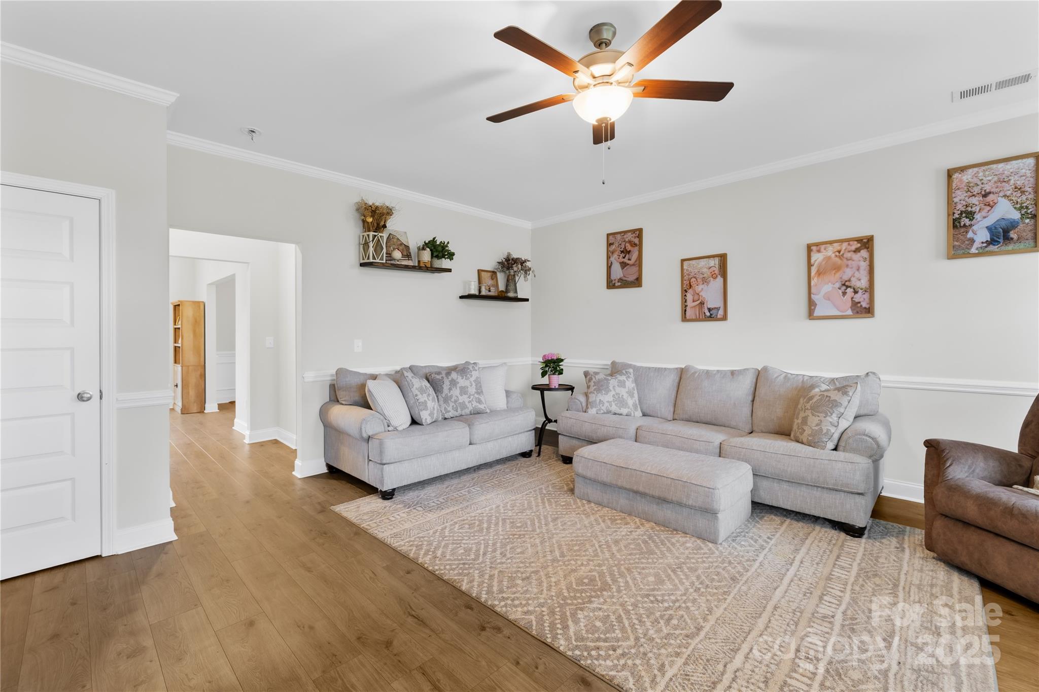 5405 Austin Road Monroe, NC 28112 - Photo 8 of 38 a living room with furniture and a ceiling fan