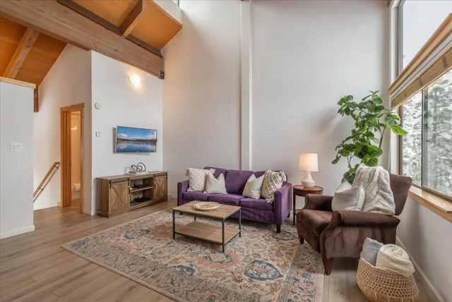 a living room with furniture and a couch