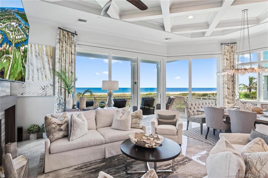 4860 Watersong Way Fort Pierce, FL 34949 - Photo 16 of 45 a living room with furniture and a large window