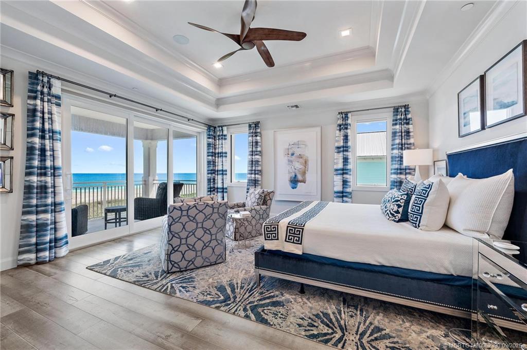 4860 Watersong Way Fort Pierce, FL 34949 - Photo 10 of 45 a bedroom with bed or furniture and a couch