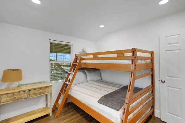 a bedroom with bunk bed