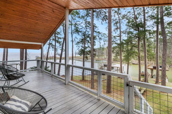 a view of balcony with furniture