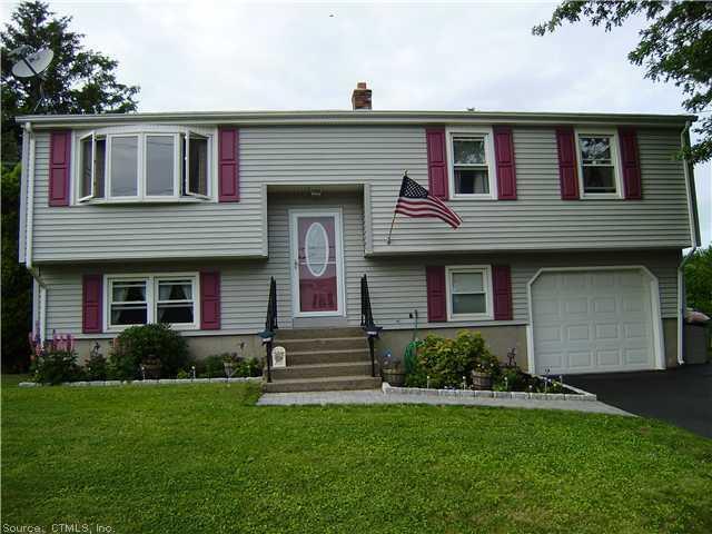 15 Sheffield Road Milford, CT 06460 - Photo 1 of 1 Exterior Front. Vinyl sided with stone walkway