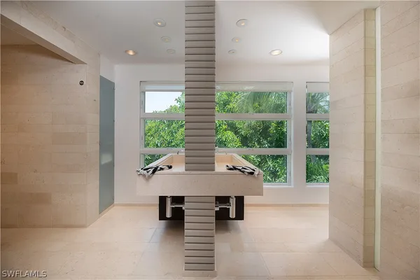 a bathroom with a sink and a bathtub